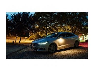 Система головного освітлення Форда..