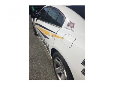 На поліцейських автомобілях США з'являться національні гасла